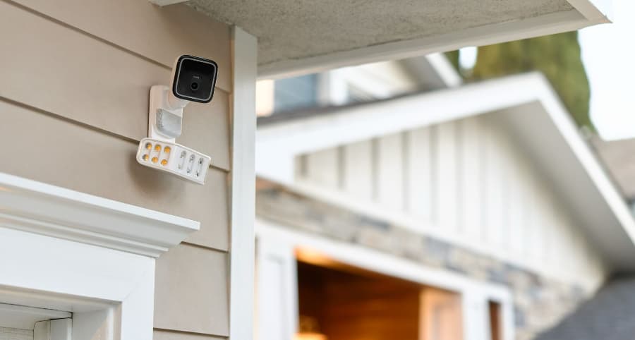 Vivint Spotlight Camera Pro fastened to a home's exterior